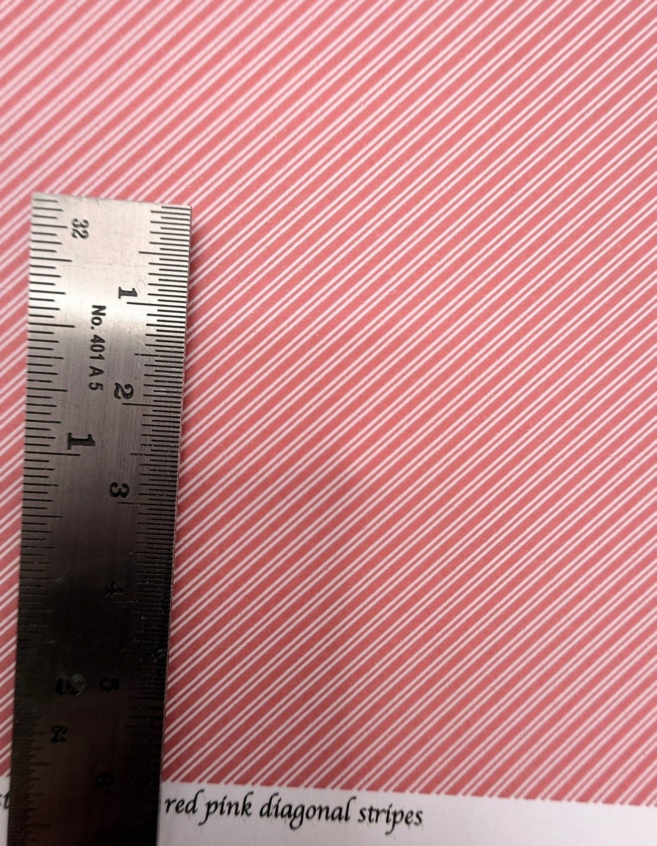 Wallpaper/fabric. Christmas contrast red/pink diagonal stripes. 1/48 scale