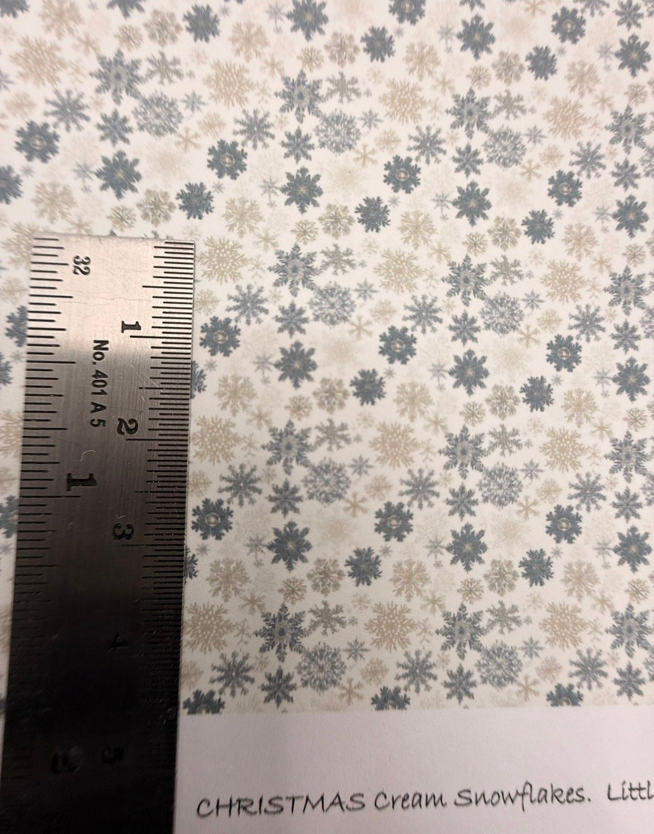 wallpaper/fabric. Christmas cream snowflakes