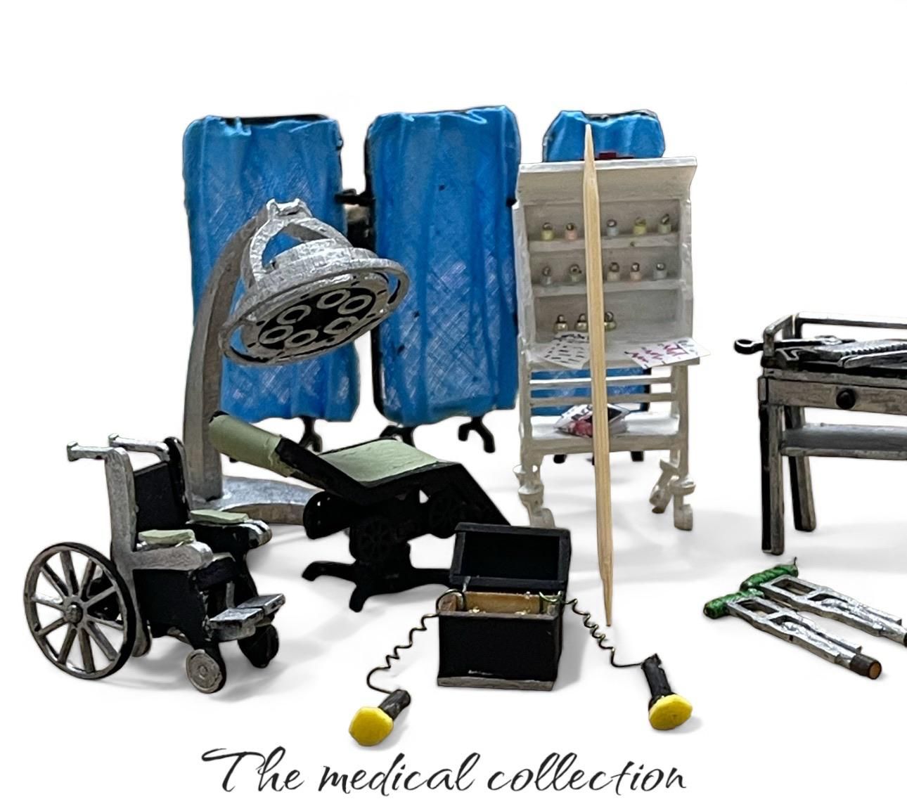 Miniature medical collection including surgical lamp, chair, wheelchair, and instruments.