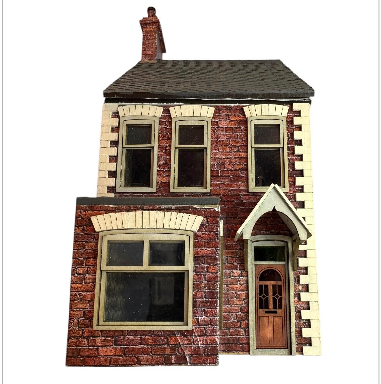 image of 1970s dollhouse with red brick