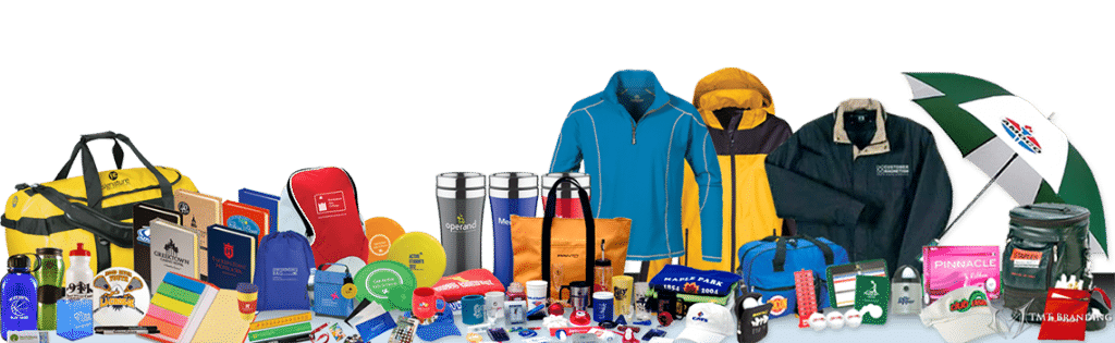 A bunch of clothes and other items are lined up on a table.