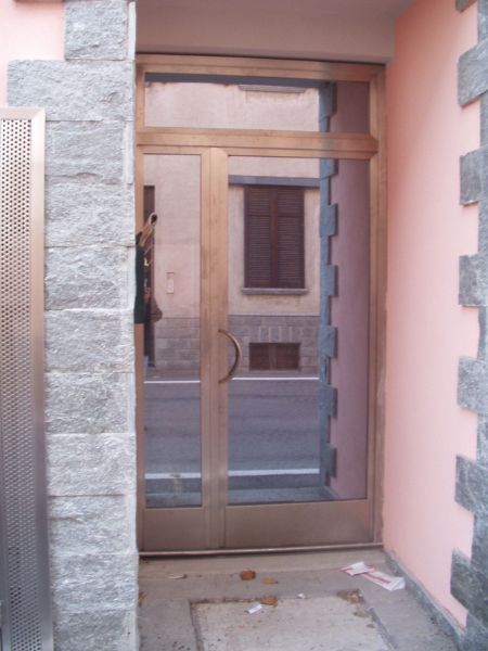 porta in ferro e vetro a specchio