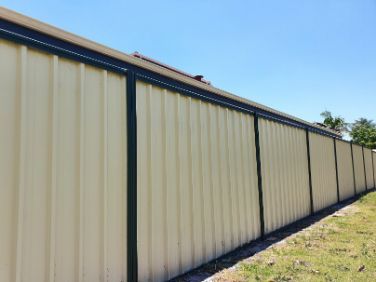 Image of a Colorbond fence in a residential area of Ballarat, VIC which provides a strong and durable boundary, offering privacy and security to the residents of the neighborhood.