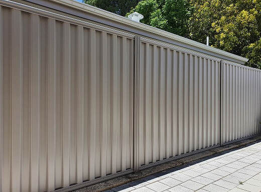 Light grey colorbond fence installed in a residential home in Ballarat, Victoria.