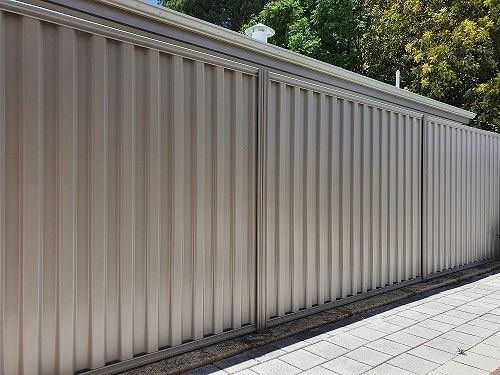 Cream Colorbond fencing was installed on a residential property in Ballarat VIC.