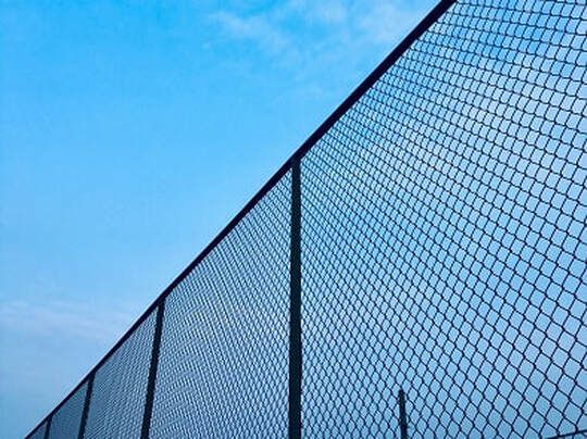 Outside view of some wire mesh fences installed for a basketball court in Ballarat, Victoria.