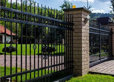 Freshly painted black colour iron residential fence and gate for a home in Ballarat, Victoria.