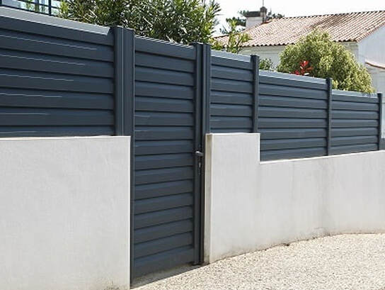 Western view of a dark grey pedestrian gate installed for a residential home in Ballarat, Victoria.