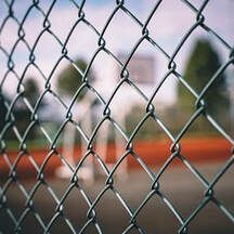 Outside view of the chain mesh fencing for a basketball court in Ballarat, Victoria.