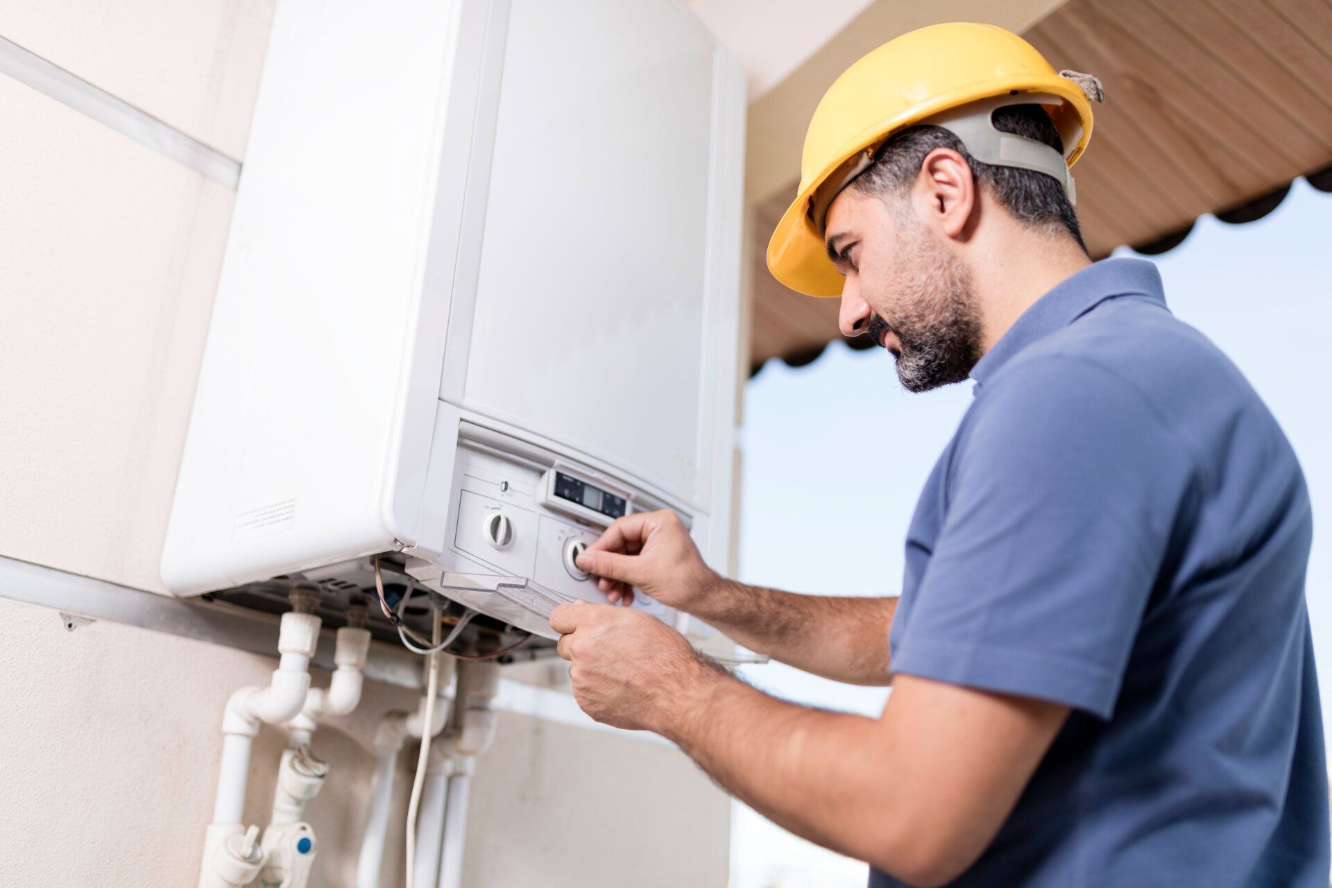 Boiler Technician Working At Home — Sydney, NSW — Seniors Plumbing