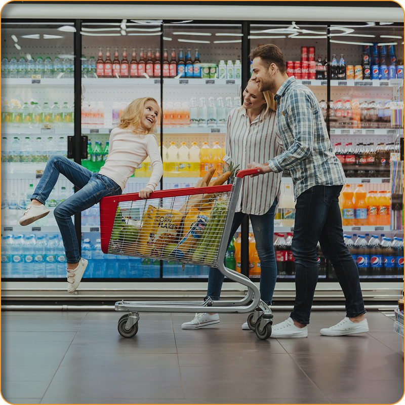 A family is shopping in a grocery store.