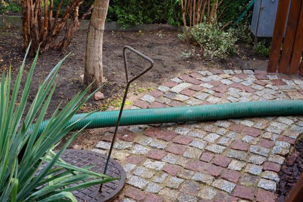 Pumping septic tank from the backyard tank in a home.