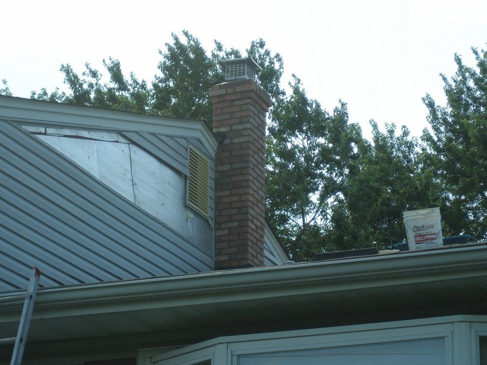 new brick chimney - residential masonry  in Middletown, NJ