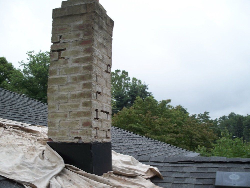 chimney in need of rebuild - residential masonry  in Middletown, NJ