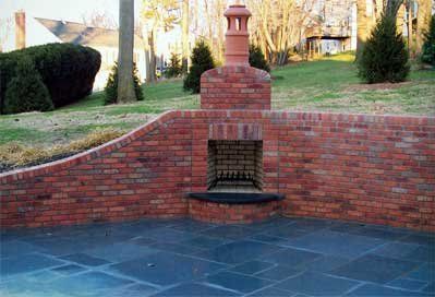 brick outdoor fireplace - outdoor living spaces clearing land to begin patio remodel - residential masonry in Middletown, NJ