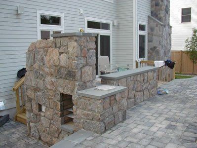 outdoor living area remodel - custom masonry clearing land to begin patio remodel - residential masonry in Middletown, NJ