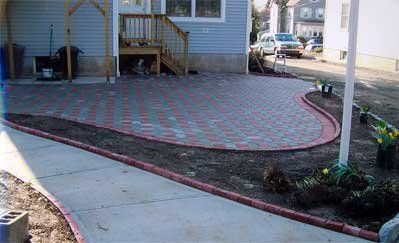 custom paver patio remodel - residential masonry contractor clearing land to begin patio remodel - residential masonry in Middletown, NJ