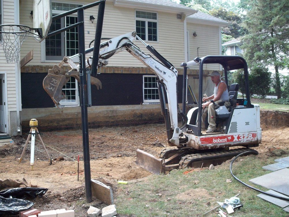 clearing land to begin patio remodel - residential masonry in Middletown, NJ