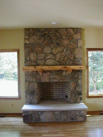rustic stone fireplace - residential masonry contractor in Middletown, NJ