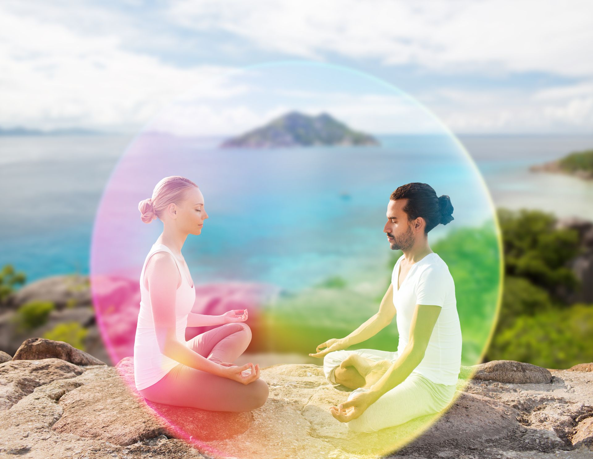 Two people meditating outdoors, facing each other. Surrounded by a colorful aura, sea and islands in the background.