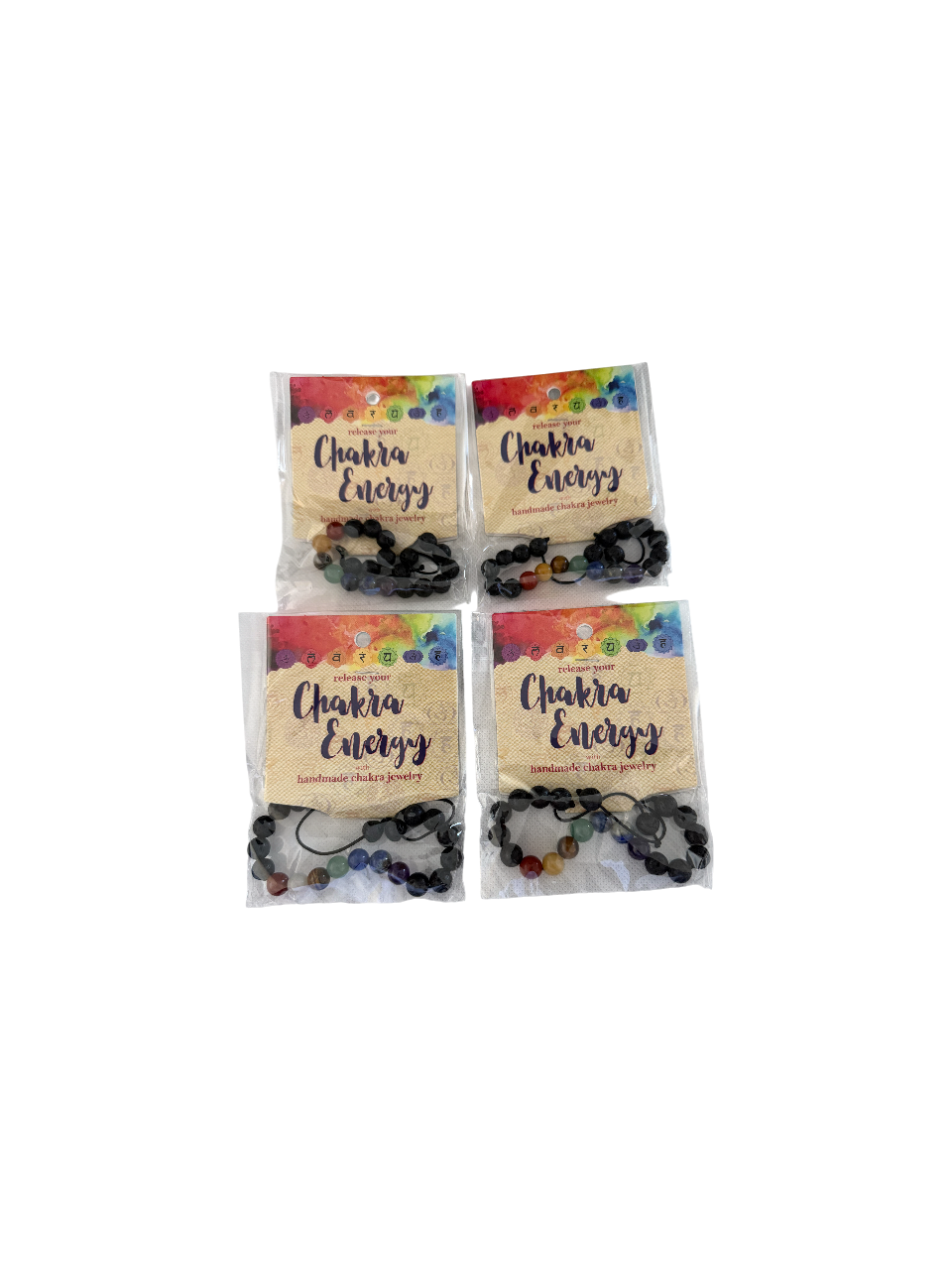 Four packaged chakra energy bracelets, each with mixed colorful beads.