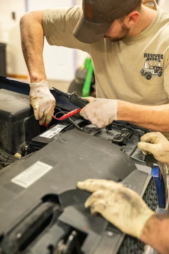 Mechanic Fixing Electrical Wirings | Revived Rides