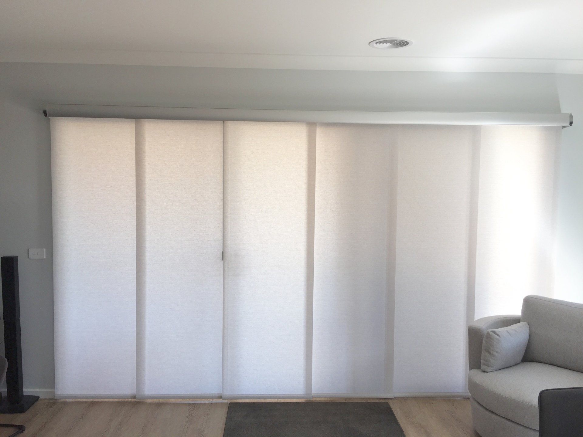 Translucent panel guide blinds on a sliding door