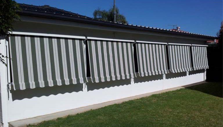 automatic lock arm fabric rollup awning