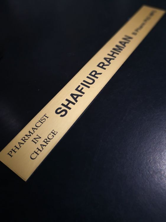 Pharmacist In Charge Name Badge — NMTG Engraving in Austinmer, NSW