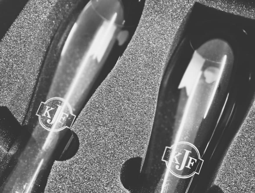 Two Champagne Flutes With the Initials — NMTG Engraving in Wollongong, NSW