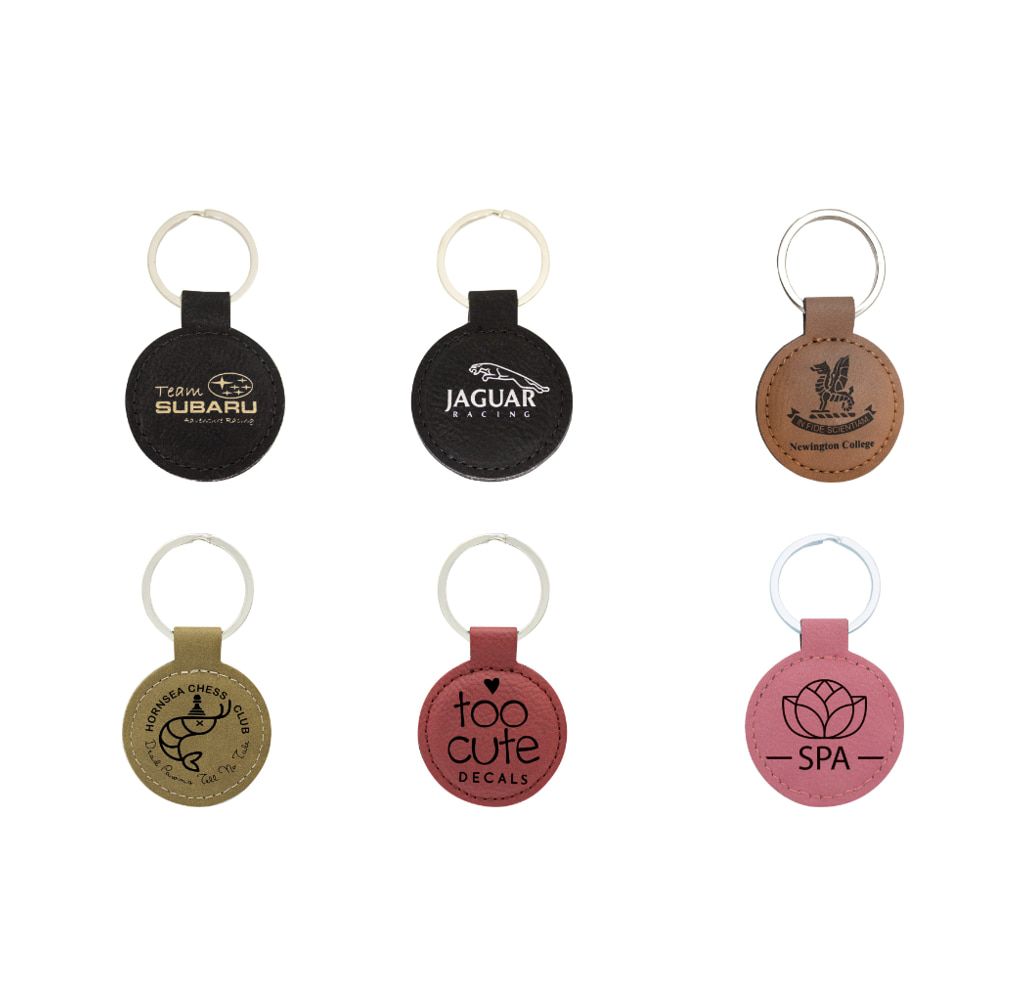A Group of Leather Keychains With Different Designs on Them — NMTG Engraving in Wollongong, NSW