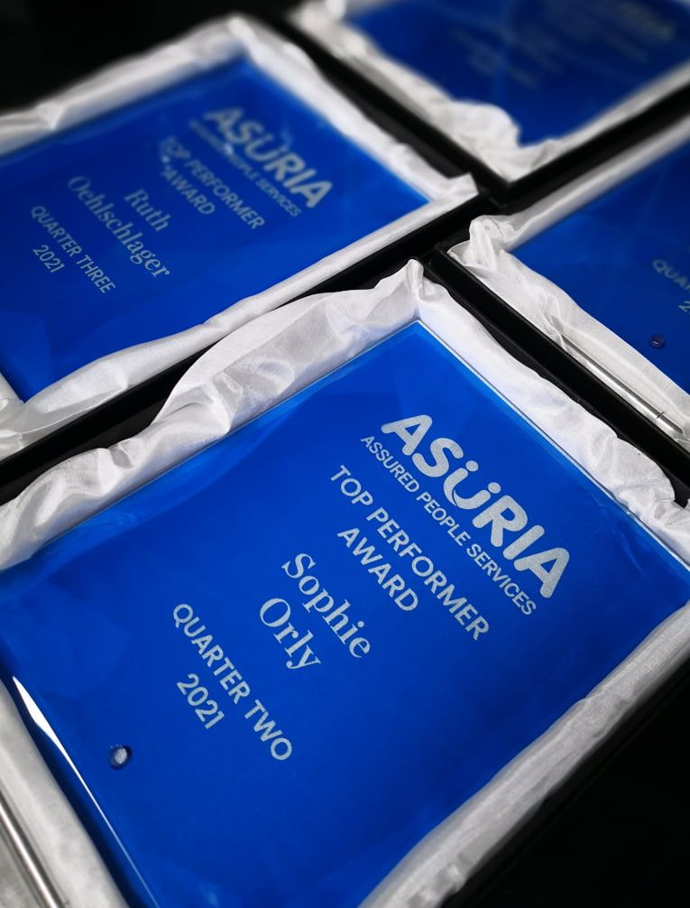 A Group of Blue Plaques With the Word Asuria on Them — NMTG Engraving in Wollongong, NSW