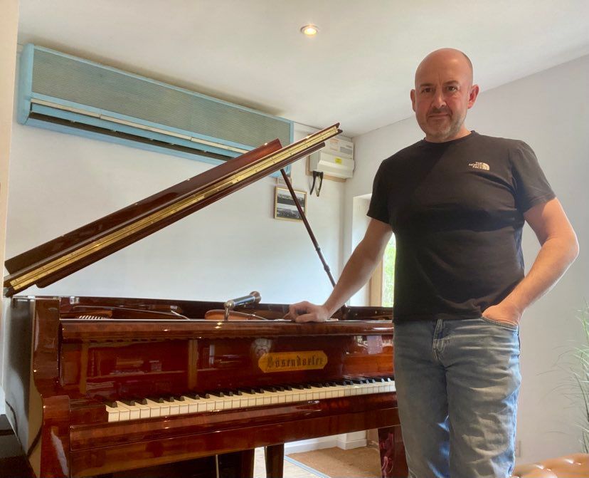 tuning a piano in Dorking