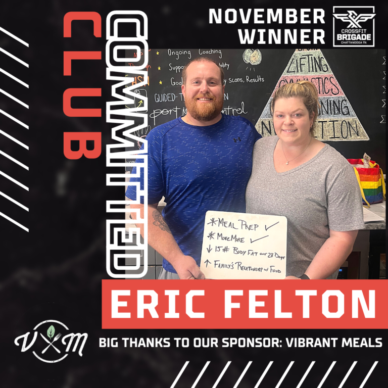 Eric Felton, Club Committed November winner. Couple holds sign with goals at gym.