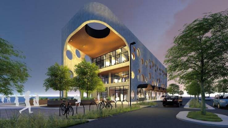 An artist 's impression of a large building with a lot of windows.