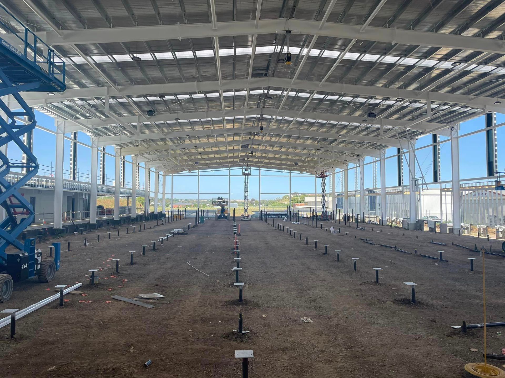 A large building under construction with a lot of windows.