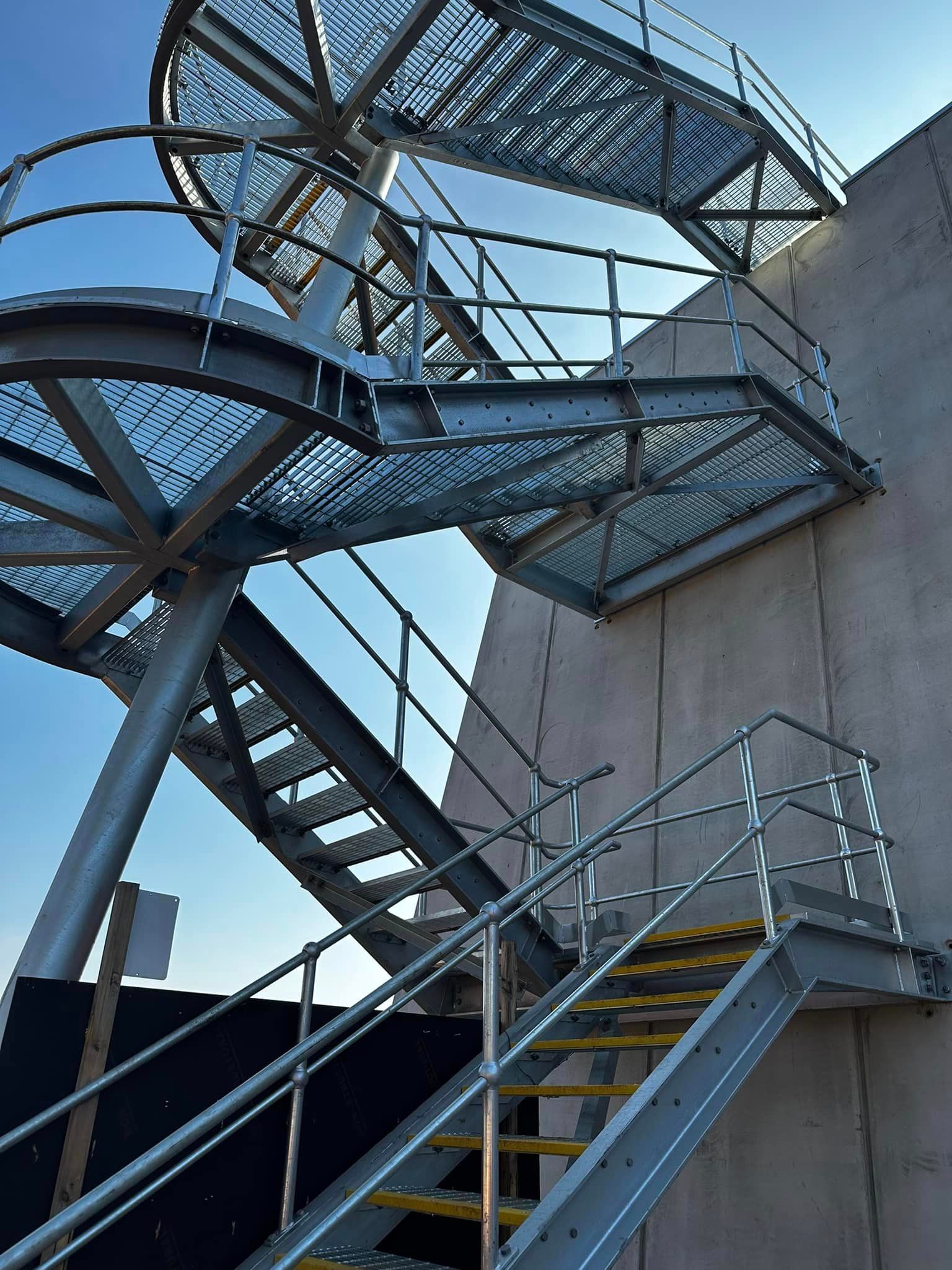 A set of metal stairs leading up to a building