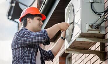 Fixing Air Conditioner — Residential And Commercial Services in Mount Vernon, OH