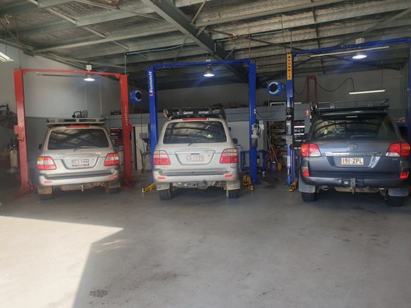 Cars Under Hoists in Workshop — Wayne Boylett Mechanical in Cairns QLD