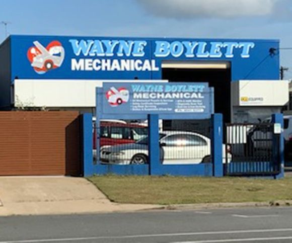 A Mechanic Fixing A Car — Wayne Boylett Mechanical in Cairns QLD