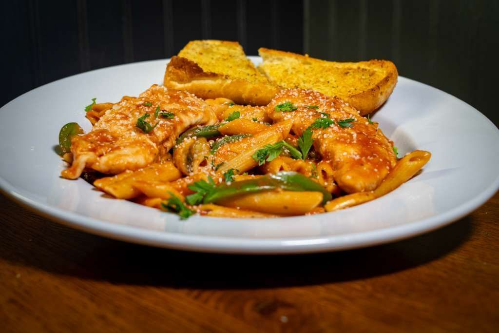 Penne Murphy, tossed in a creamy Murphy sauce with garlic, sautéed mushrooms, bell peppers, and onions.