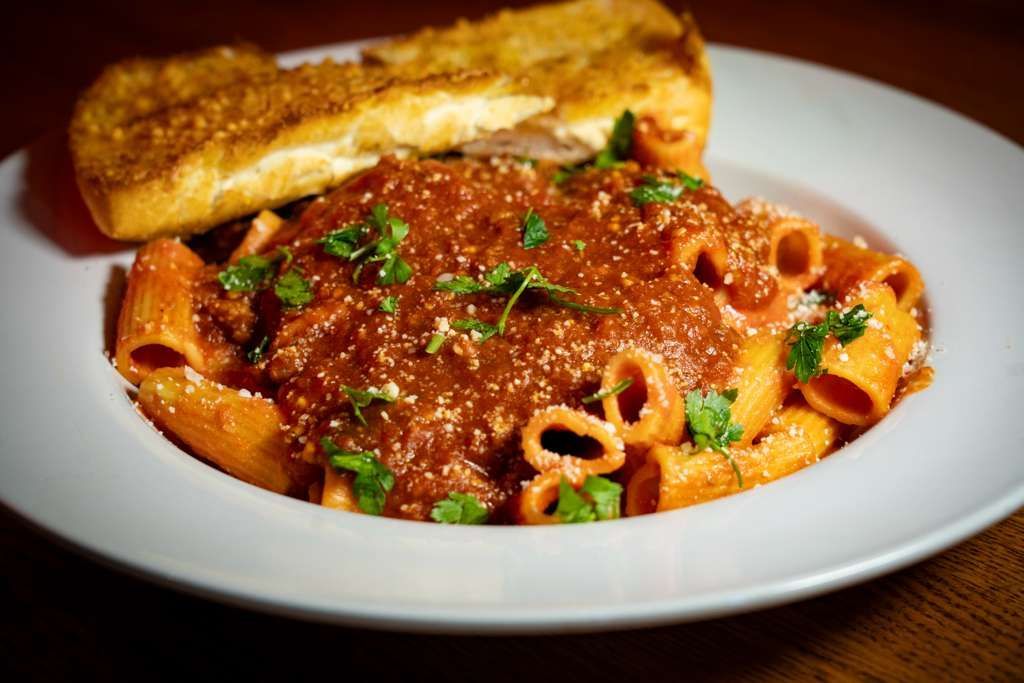 Rigatoni pasta tossed in our classic marinara sauce and creamy ricotta, finished with parmesan and fresh herbs.