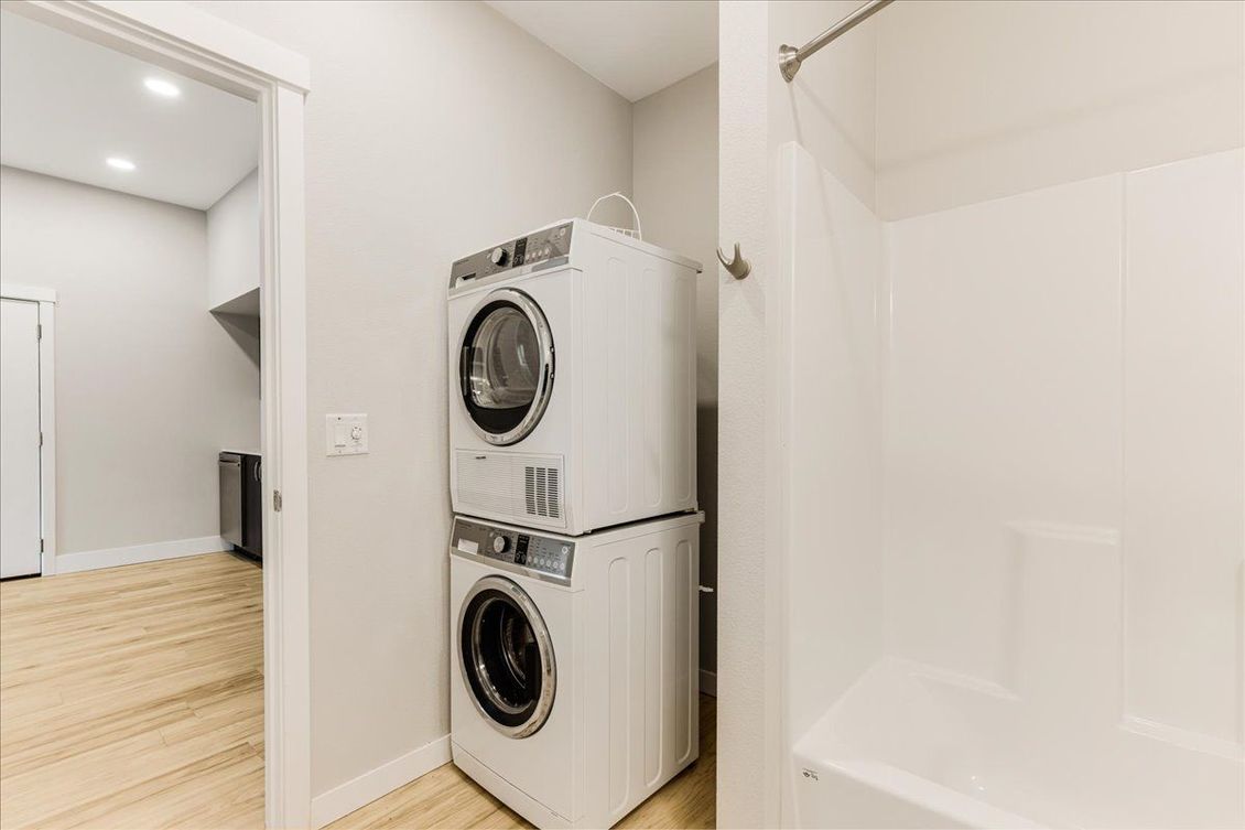 a washer and dryer are stacked on top of each other