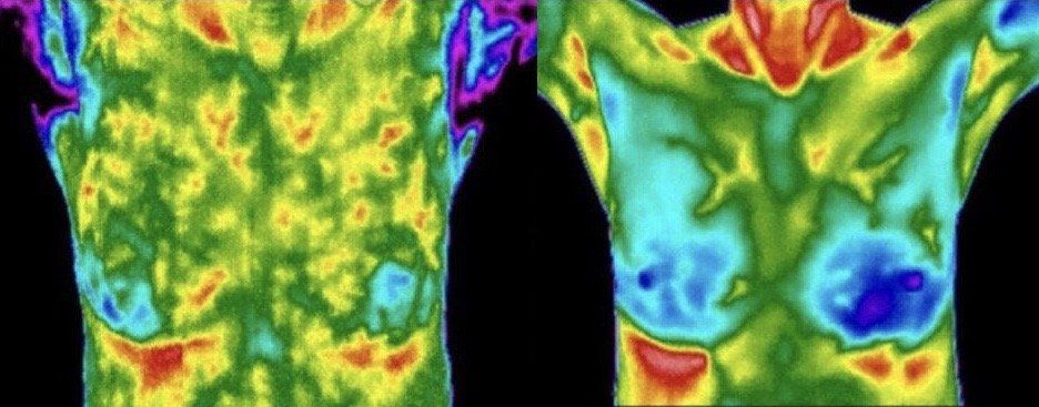 A thermal image of a person 's torso and hands.