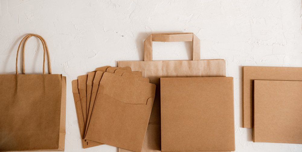 Brown Craft Paper Package With Handles — TMAC Packaging & The Coffee Mariner In the Whitsundays
