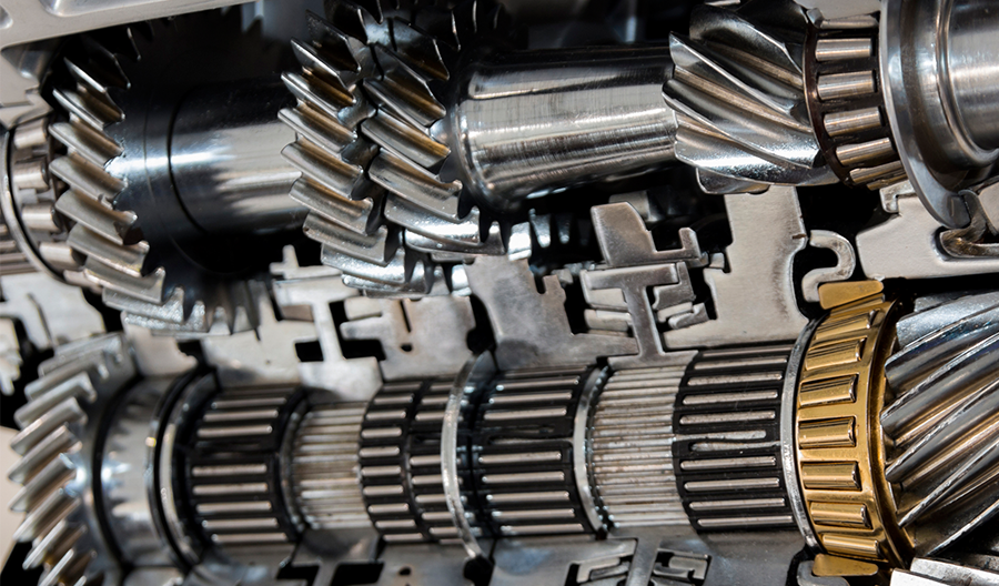 A close up of a gearbox with a lot of gears