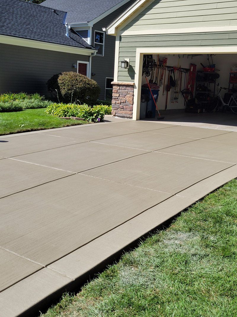 Workers Sealing the Driveway — St Paul, MN — Joseph Construction of St. Paul, Inc