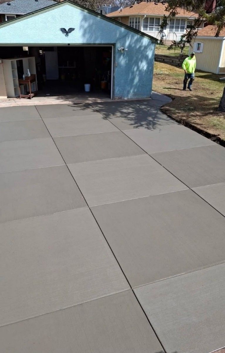 Workers Sealing the Driveway — St Paul, MN — Joseph Construction of St. Paul, Inc