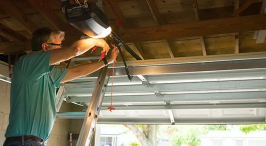 Inspecting-Garage-Door-Sensors