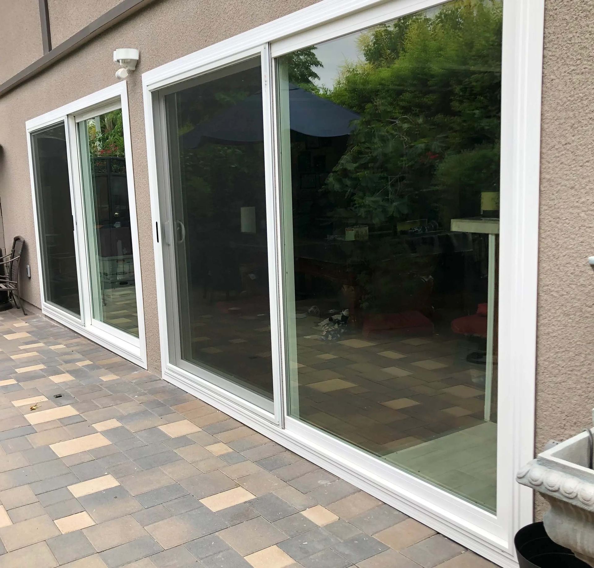 A house with a lot of sliding glass doors